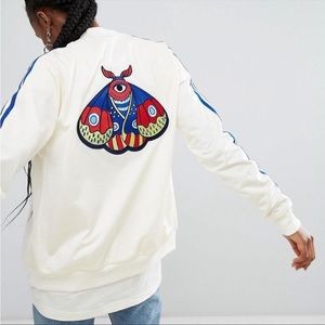 Adidas Originals embroidered evil eye moth jacket